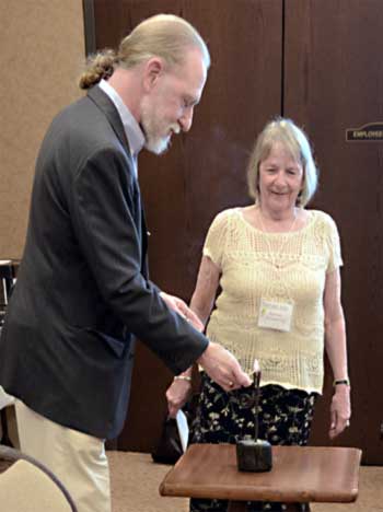 Joe Hays Lights the Rush to Begin the Meeting Joe Hays lights the rush to open the meeting.