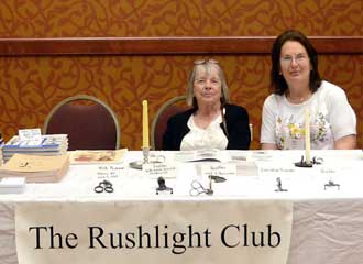 Rushlight Club Show Table Rushlight Club show table with lighting items for display and discussion